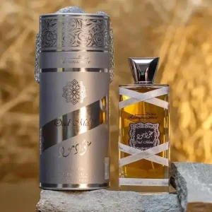 Experience the evocative allure of Oud Mood Reminiscence (Silver) by Lattafa, a captivating 100ml Eau de Parfum that blends rich woody notes, aromatic spices, and musky accords.