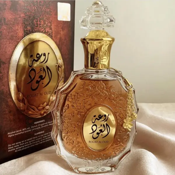 Introducing Rouat Al Oud Perfume by Lattafa—a captivating fragrance that blends citrusy freshness with spicy warmth and earthy richness.